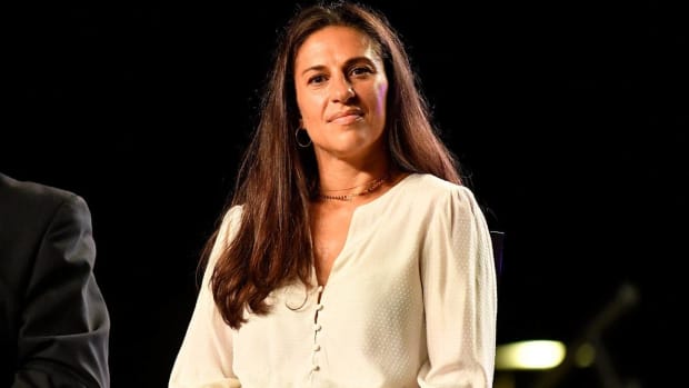 Former USWNT midfielder Carli Lloyd looks on during her retirement celebration.